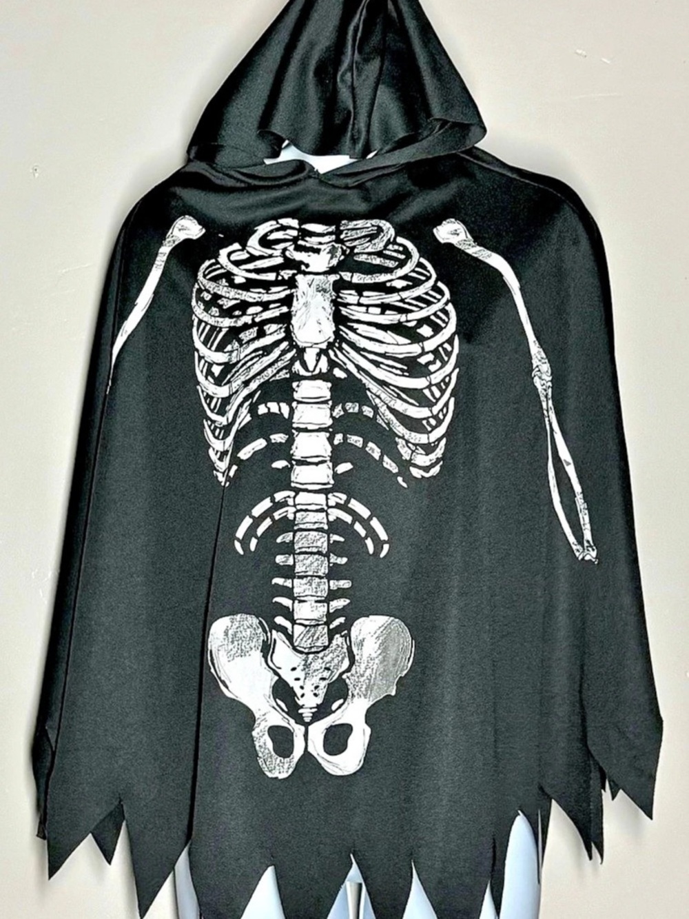 Spirit Halloween Adult Skeleton Poncho Black